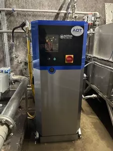 Delta booster pressure washer unit installed to supply multiple high- and low-pressure wash points at an industrial site in Burton.